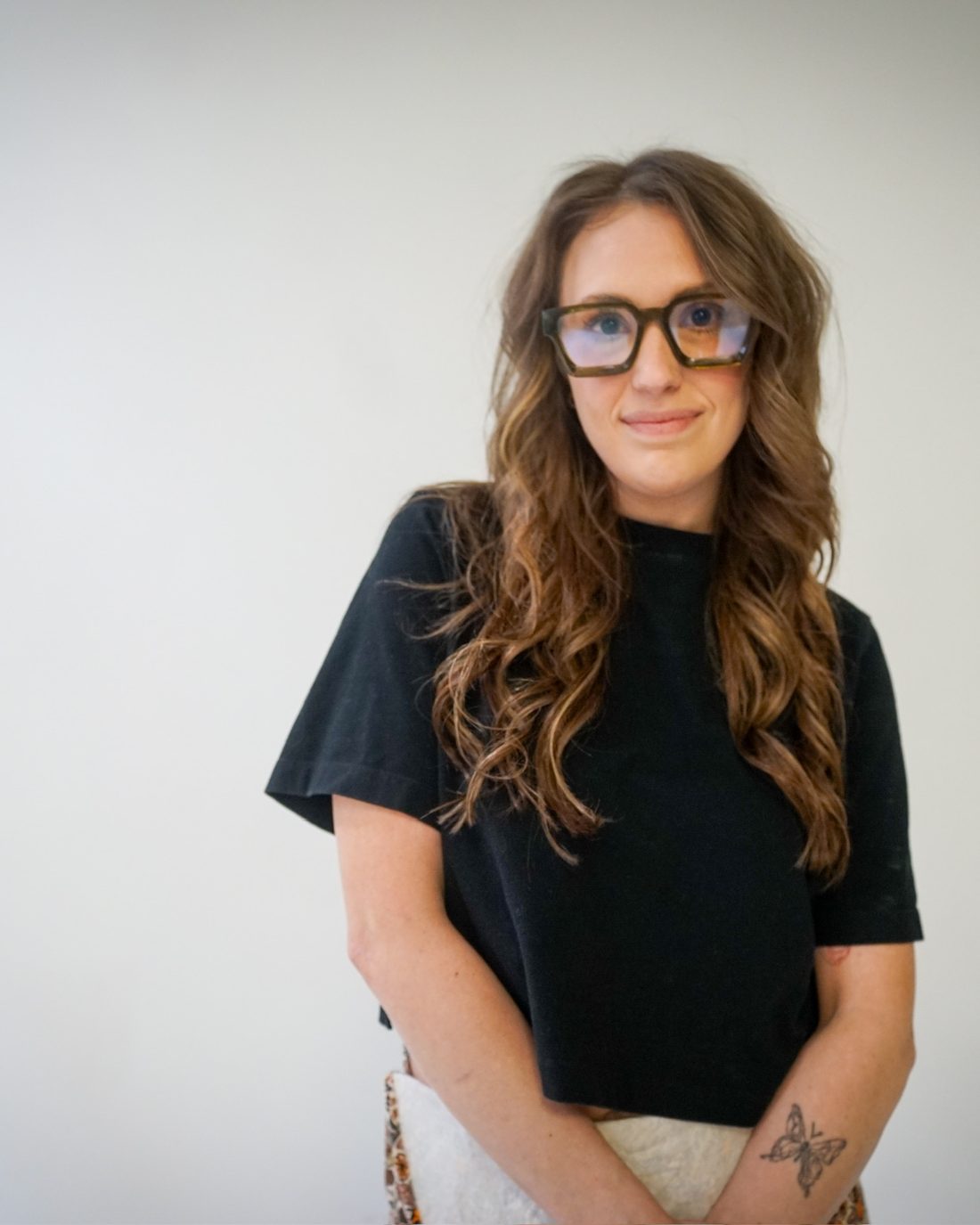 Alise McCreary in glasses, smiling